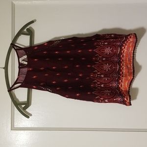 Trendy summer top. Medium, but fits small.